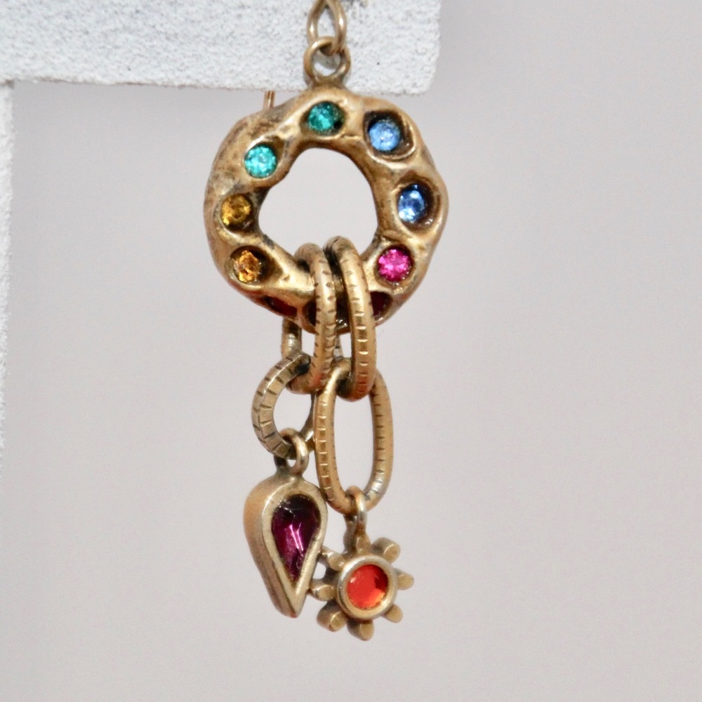 Gold and crystal earrings.  Patricia Locke